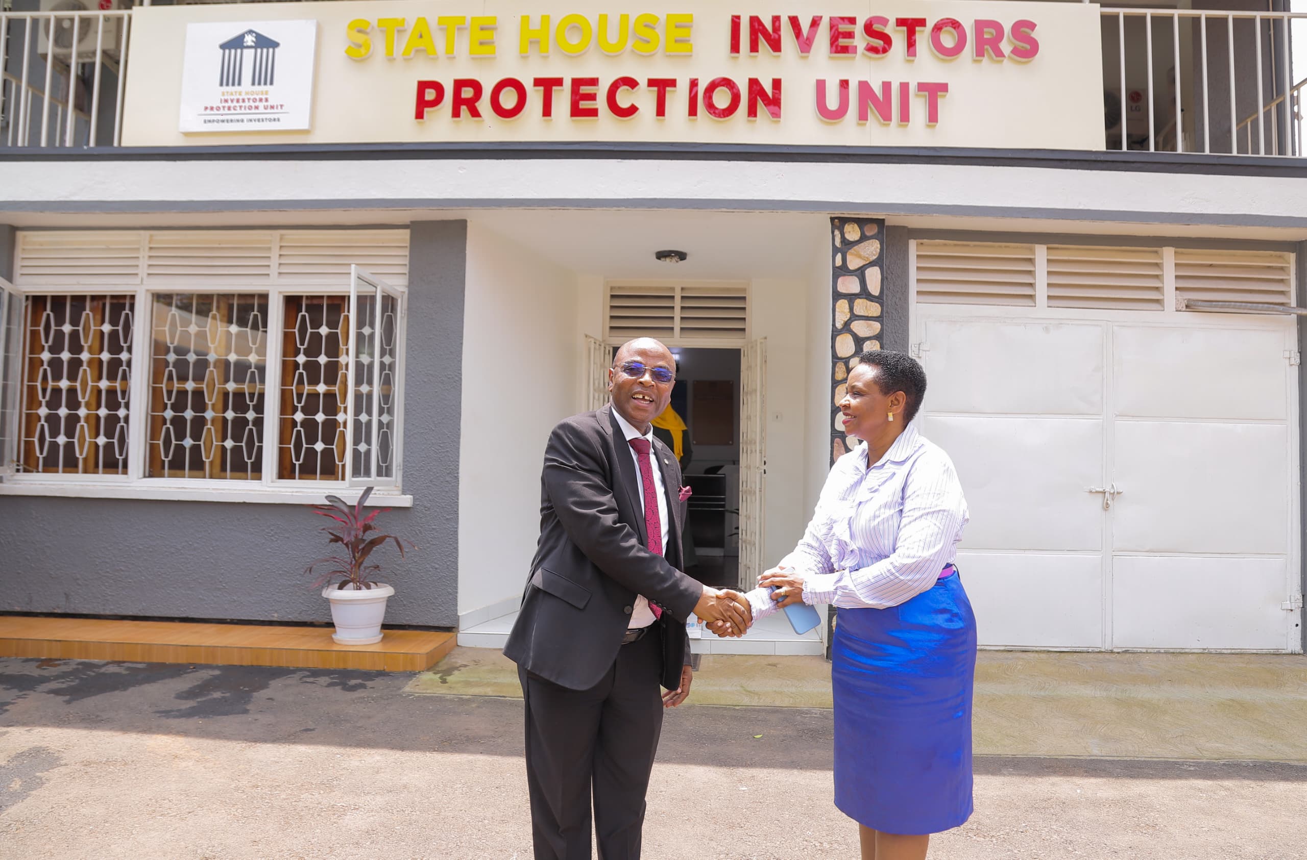 Col. Edith Nakalema with Professor Augustus Nuwagaba
